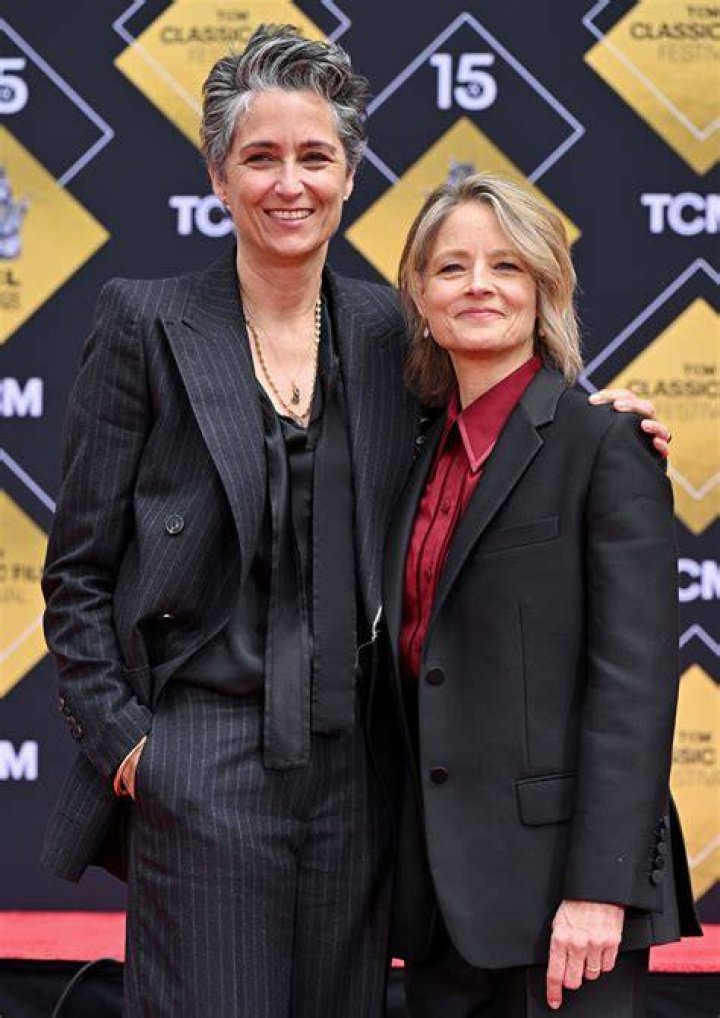 Alexandra Hedison with her wife Jordie Foster at an event