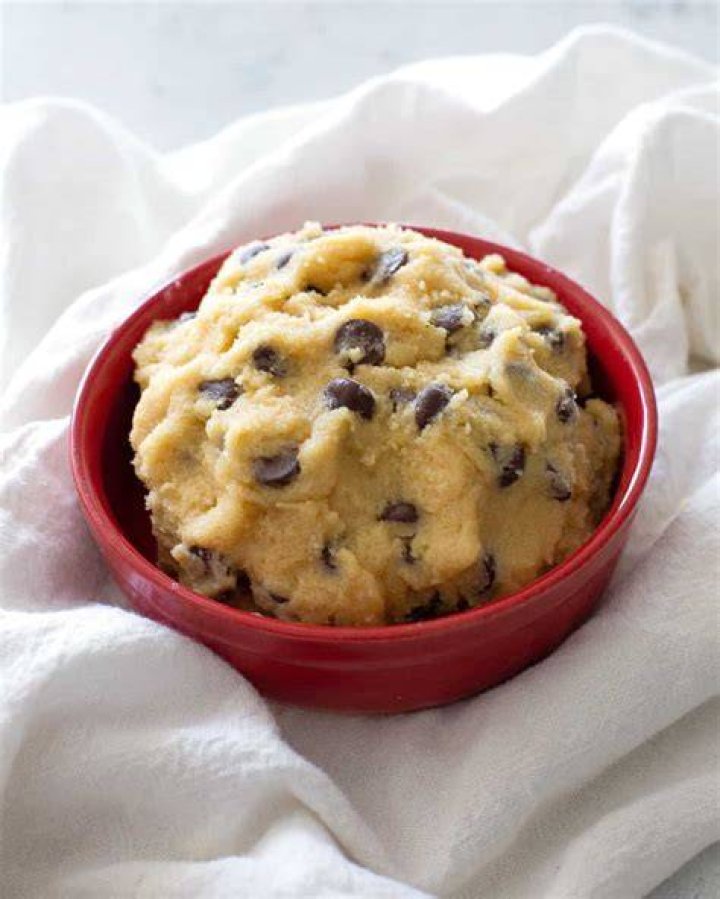 Chocolate peanut butter cookie dough in a glass bowl