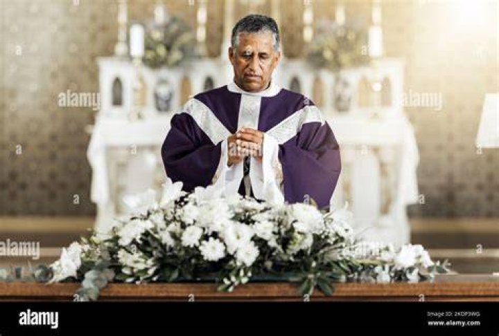 Priest at funeral